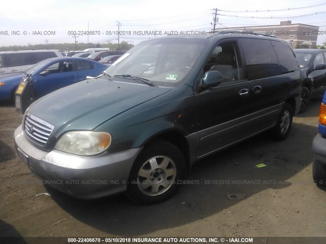 KNDUP131726340110 - 2002 KIA SEDONA EX/LX GREEN photo 2