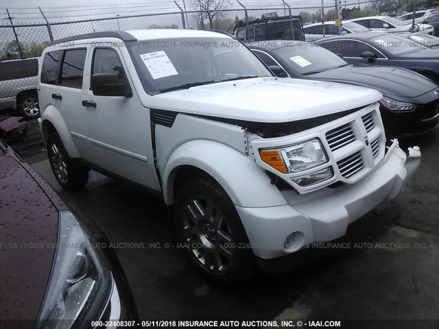 1D4PU4GK6BW542093 - 2011 DODGE NITRO HEAT WHITE photo 1