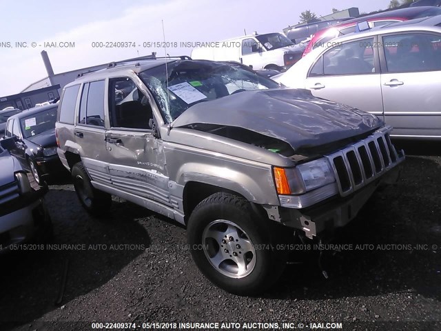 1J4GZ58S7VC647230 - 1997 JEEP GRAND CHEROKEE LAREDO/TSI GRAY photo 1