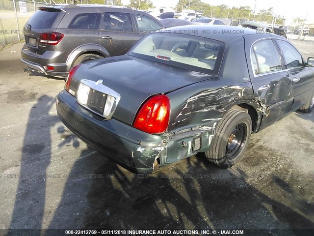 1LNHM82W4XY714910 - 1999 LINCOLN TOWN CAR SIGNATURE GREEN photo 6