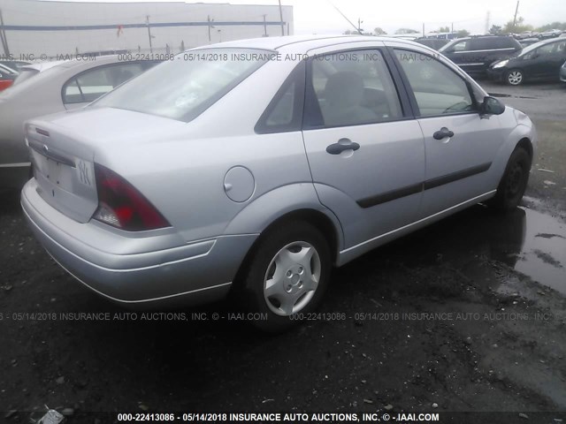 1FAFP33P23W195722 - 2003 FORD FOCUS LX SILVER photo 4