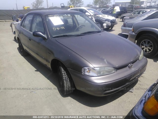 1Y1SK5284XZ424530 - 1999 CHEVROLET GEO PRIZM LSI BROWN photo 1