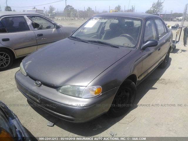 1Y1SK5284XZ424530 - 1999 CHEVROLET GEO PRIZM LSI BROWN photo 2