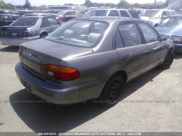 1Y1SK5284XZ424530 - 1999 CHEVROLET GEO PRIZM LSI BROWN photo 4