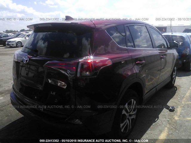 JTMZFREV1JD112590 - 2018 TOYOTA RAV4 LE RED photo 4