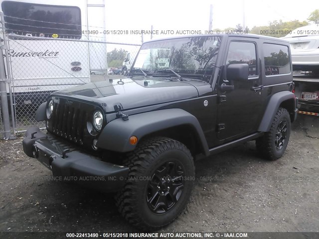 1C4AJWAG0HL657889 - 2017 JEEP WRANGLER SPORT Qara foto 2