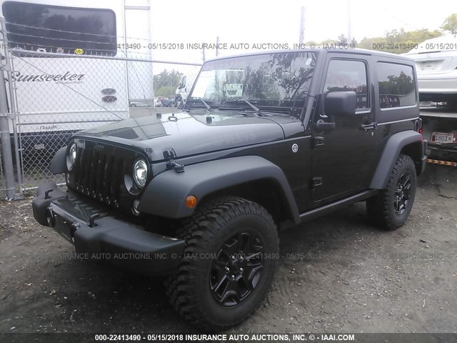 1C4AJWAG0HL657889 - 2017 JEEP WRANGLER SPORT BLACK photo 2