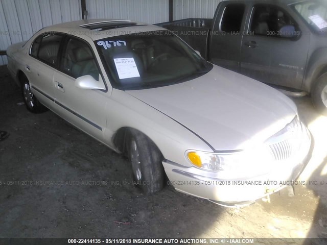 1LNHM97V72Y700451 - 2002 LINCOLN CONTINENTAL  TAN photo 1