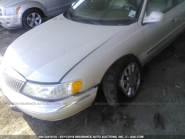 1LNHM97V72Y700451 - 2002 LINCOLN CONTINENTAL  TAN photo 6