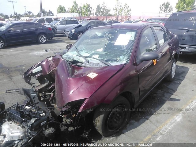 1FAHP34NX7W129303 - 2007 FORD FOCUS ZX4/S/SE/SES RED photo 2