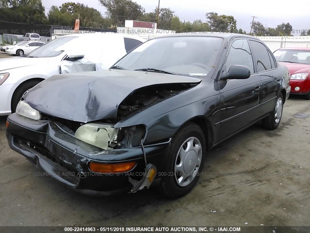 1NXBB02E9VZ583403 - 1997 TOYOTA COROLLA DX GREEN photo 2