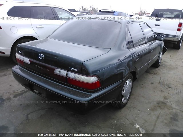 1NXBB02E9VZ583403 - 1997 TOYOTA COROLLA DX GREEN photo 4