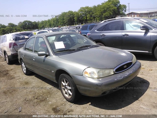 1FAFP663XXK134044 - 1999 FORD CONTOUR SE GREEN photo 1