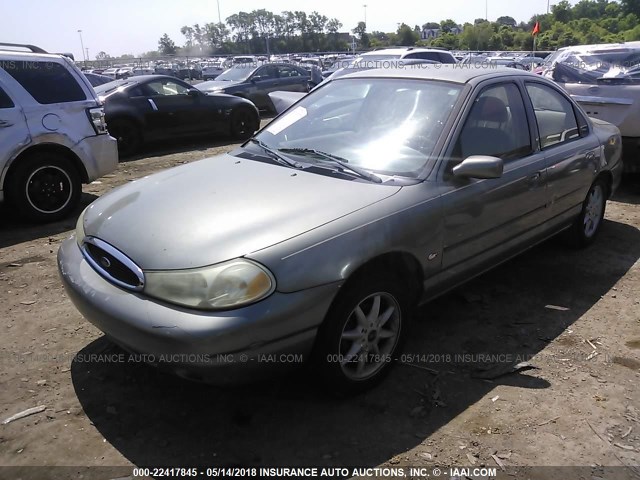 1FAFP663XXK134044 - 1999 FORD CONTOUR SE GREEN photo 2