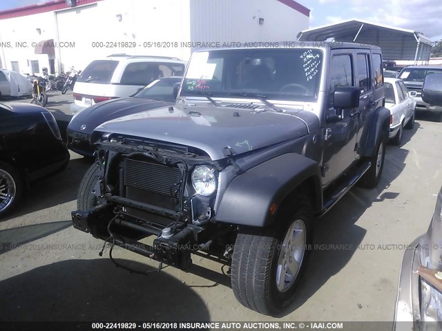 1C4BJWDG0HL585933 - 2017 JEEP WRANGLER UNLIMITE SPORT GRAY photo 2