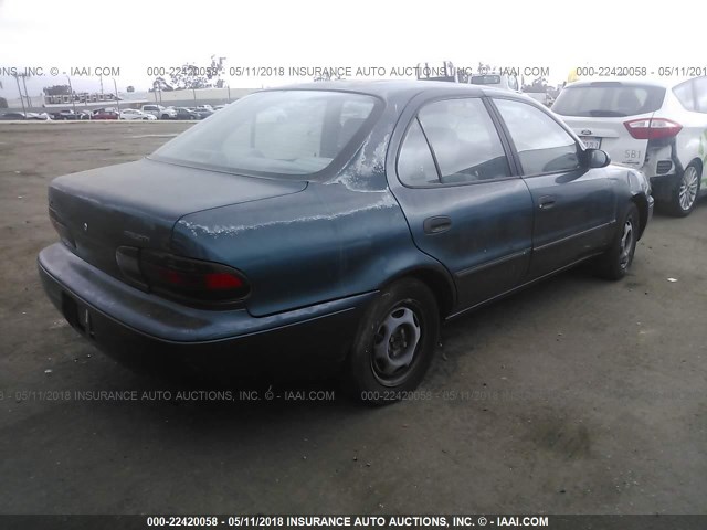 1Y1SK5381PZ030238 - 1993 GEO PRIZM LSI GREEN photo 4