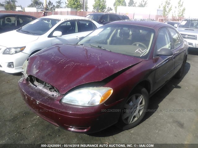 1FAFP52264G145984 - 2004 FORD TAURUS LX RED photo 2