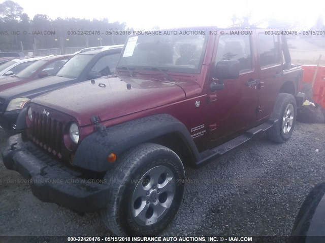 1C4BJWDGXCL232138 - 2012 JEEP WRANGLER UNLIMITE SPORT MAROON photo 2