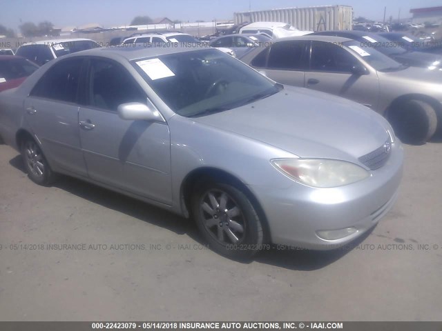 JTDBE30K930195338 - 2003 TOYOTA CAMRY LE/XLE SILVER photo 1