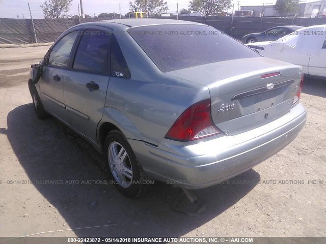 1FAFP34Z94W126513 - 2004 FORD FOCUS SE COMFORT/SE SPORT Light Blue photo 3