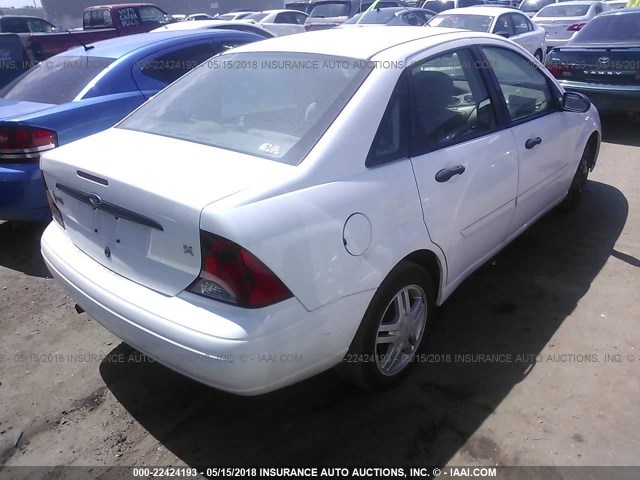 1FAHP34363W146284 - 2003 FORD FOCUS SE COMFORT/SE SPORT WHITE photo 4