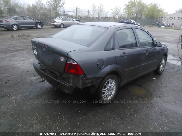 1FAFP34N77W322483 - 2007 FORD FOCUS ZX4/S/SE/SES GRAY photo 4