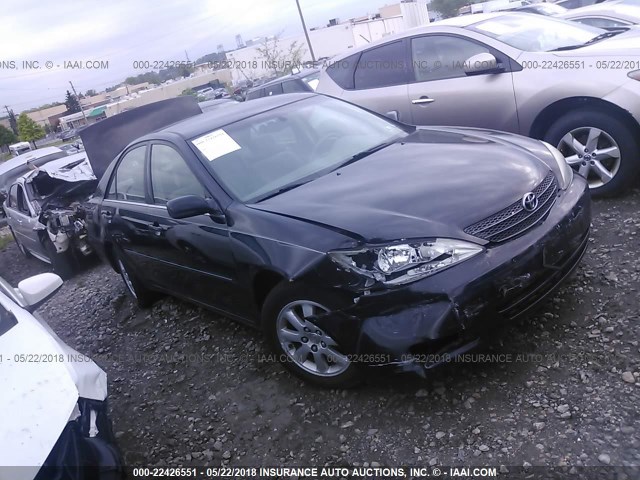 JTDBE32K220038309 - 2002 TOYOTA CAMRY LE/XLE/SE BLACK photo 1