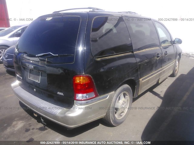 2FMZA5344YBB05095 - 2000 FORD WINDSTAR SEL BLACK photo 4