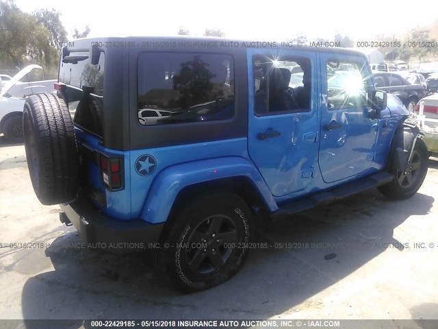 1C4BJWDG0GL214723 - 2016 JEEP WRANGLER UNLIMITE SPORT BLUE photo 4