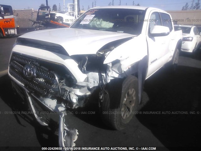 3TMAZ5CN1GM001695 - 2016 TOYOTA TACOMA DBL CAB/SR5/TRD SPORT/OR WHITE photo 2