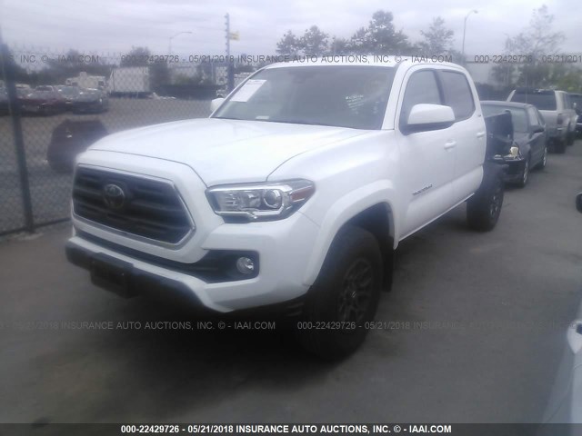 3TMAZ5CN1JM054260 - 2018 TOYOTA TACOMA DBL CAB/SR5/TRD SPORT/OR WHITE photo 2