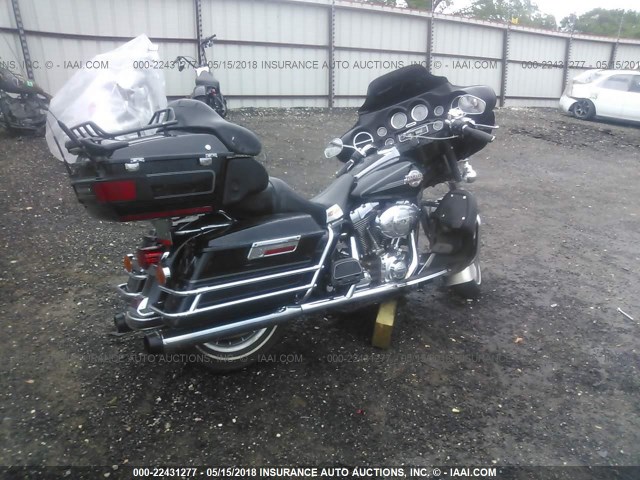 1HD1FC41X7Y717149 - 2007 HARLEY-DAVIDSON FLHTCUI BLACK photo 4