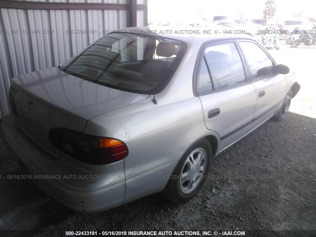 1Y1SK5485XZ415302 - 1999 CHEVROLET GEO PRIZM LSI SILVER photo 4