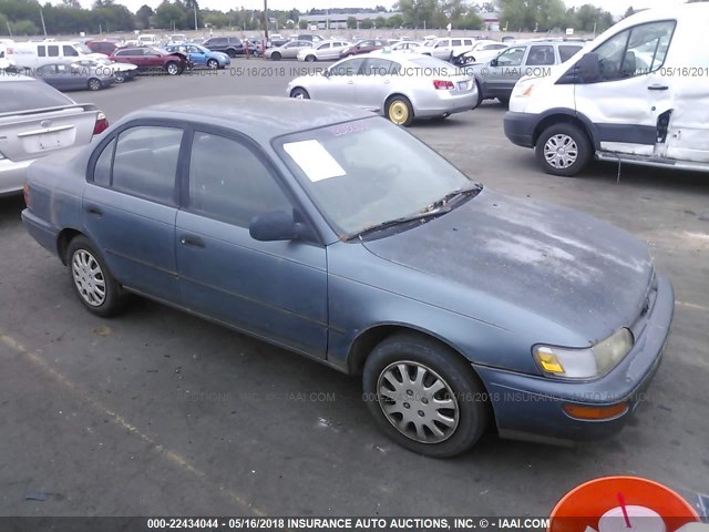 1NXAE09BXRZ144652 - 1994 TOYOTA COROLLA LE/DX მუქი ლურჯი ფოტო 1