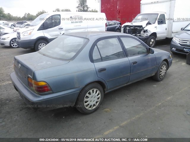 1NXAE09BXRZ144652 - 1994 TOYOTA COROLLA LE/DX მუქი ლურჯი ფოტო 4