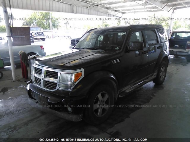 1D8GU28K29W530812 - 2009 DODGE NITRO SE BLACK photo 2