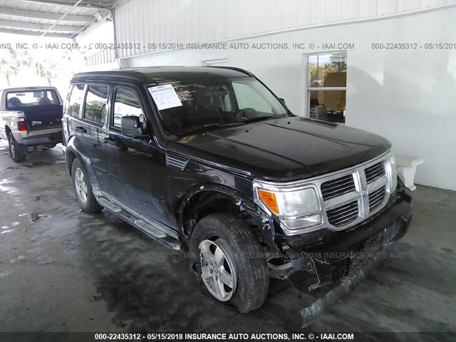 1D8GU28K29W530812 - 2009 DODGE NITRO SE BLACK photo 6