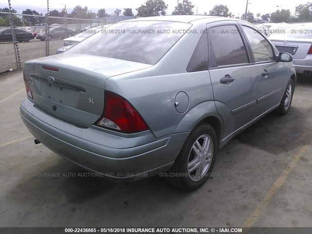 1FAFP34Z43W324740 - 2003 FORD FOCUS SE COMFORT/SE SPORT GREEN photo 4