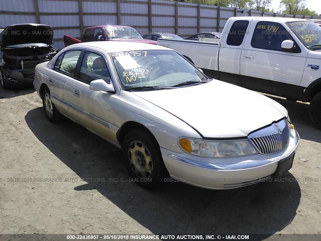 1LNHM97V0XY664481 - 1999 LINCOLN CONTINENTAL  TAN photo 1