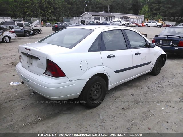 1FAFP33P93W321445 - 2003 FORD FOCUS LX WHITE photo 4