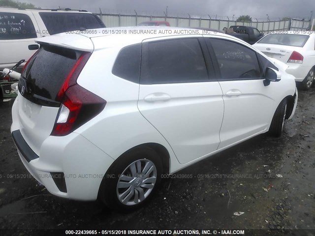 JHMGK5H54GX008625 - 2016 HONDA FIT LX WHITE photo 4