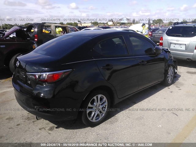 3MYDLBZV7GY107762 - 2016 TOYOTA SCION IA BLACK photo 4