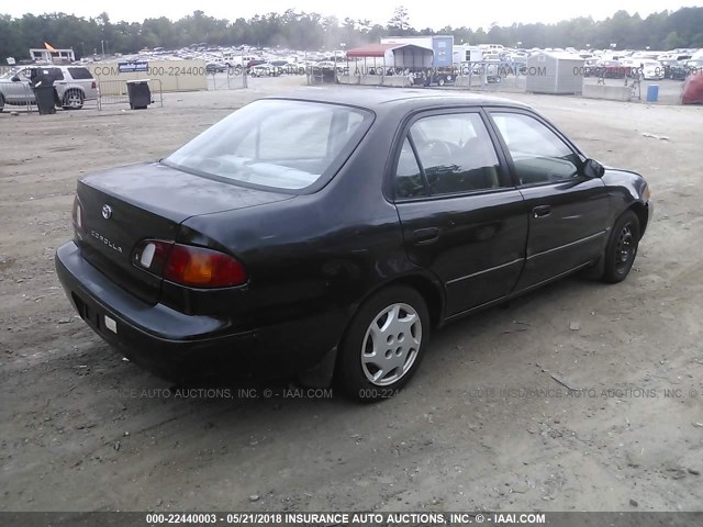 1NXBR12E7YZ322941 - 2000 TOYOTA COROLLA VE/CE/LE BLACK photo 4