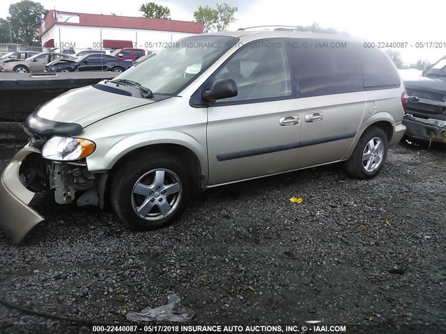 1D4GP45R55B250728 - 2005 DODGE CARAVAN SXT GOLD photo 2