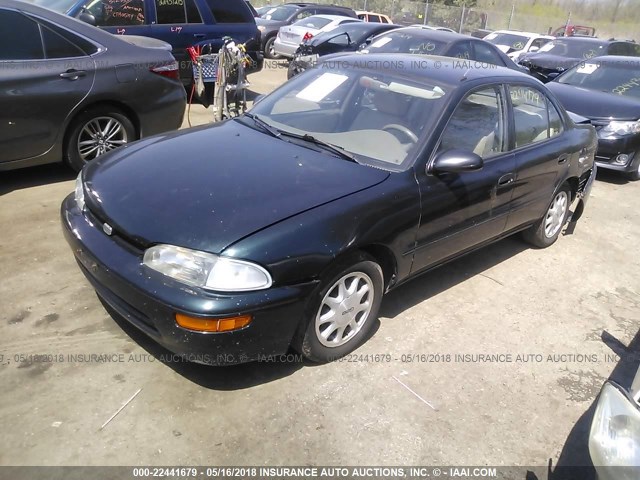 1Y1SK5266VZ413704 - 1997 GEO PRIZM LSI GREEN photo 2