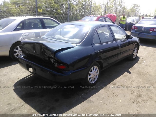 1Y1SK5266VZ413704 - 1997 GEO PRIZM LSI GREEN photo 4