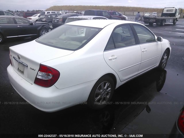 JTDBE30K940282061 - 2004 TOYOTA CAMRY LE/XLE WHITE photo 4