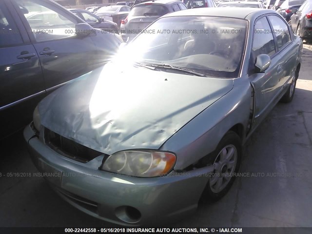 KNAFB121425201922 - 2002 KIA SPECTRA LS TEAL photo 2