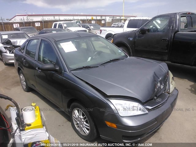 1FAFP34N67W347018 - 2007 FORD FOCUS ZX4/S/SE/SES GRAY photo 1