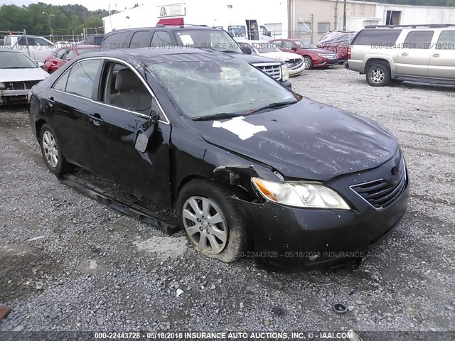 4T1BK46K57U041936 - 2007 TOYOTA CAMRY NEW GENERAT LE/XLE/SE BLACK photo 1